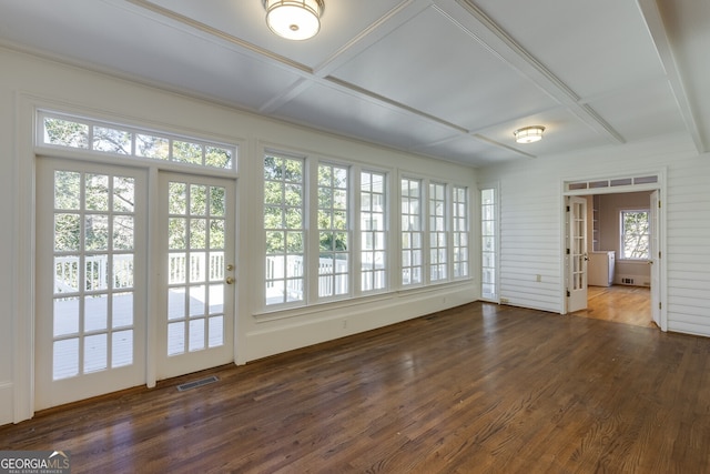 unfurnished sunroom featuring coffered ceiling and visible vents