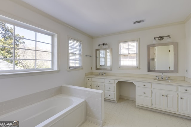 full bathroom with double vanity, ornamental molding, a sink, and visible vents