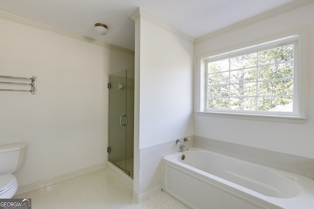 full bathroom featuring a garden tub, toilet, ornamental molding, a stall shower, and baseboards