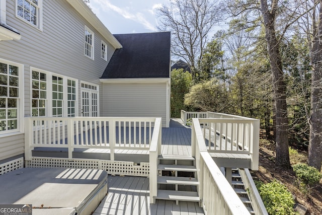 deck featuring stairway