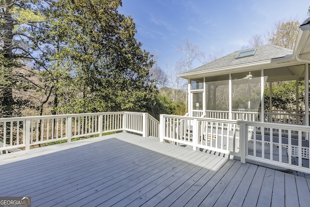 deck featuring a sunroom