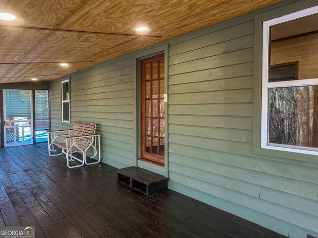 wooden deck featuring a porch