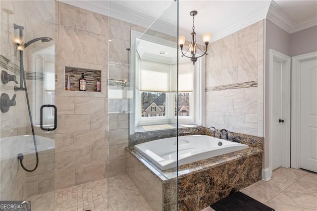 bathroom featuring a stall shower, a garden tub, and crown molding