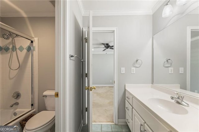 bathroom with ornamental molding, vanity, toilet, and shower / bathing tub combination