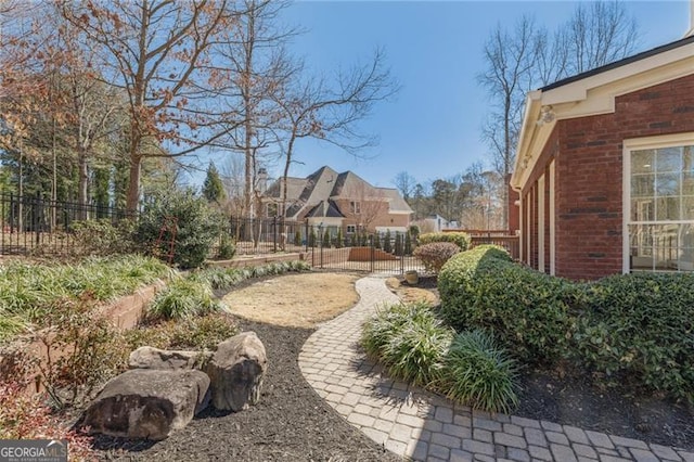 view of yard featuring fence