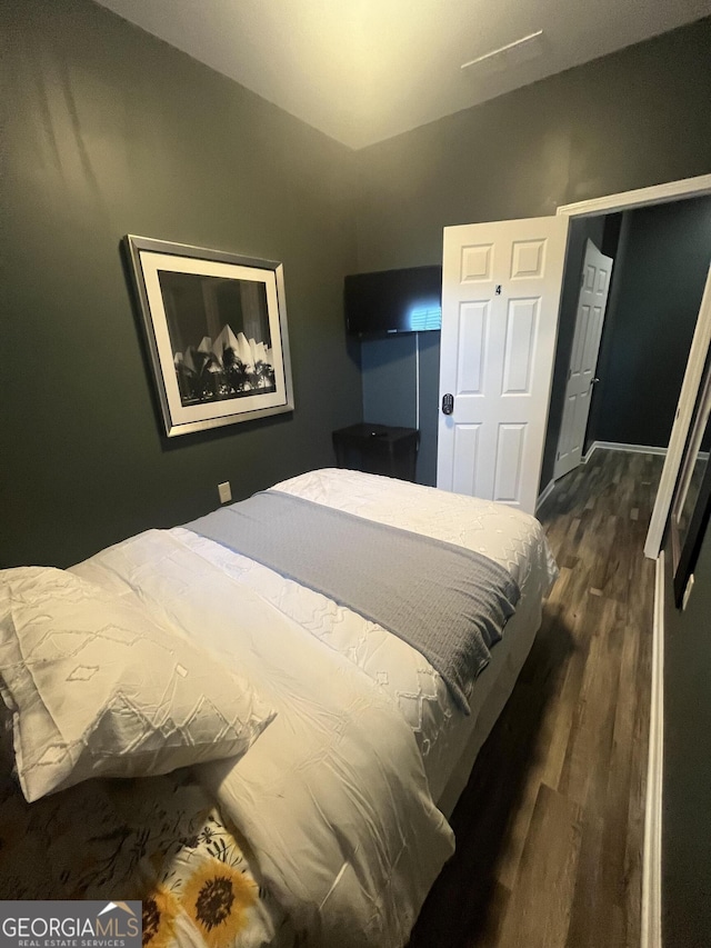 1528 Olympian Way SW, Atlanta, GA 30310 - bedroom with dark wood-type flooring and baseboards