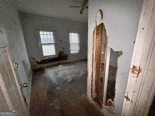 miscellaneous room featuring a ceiling fan