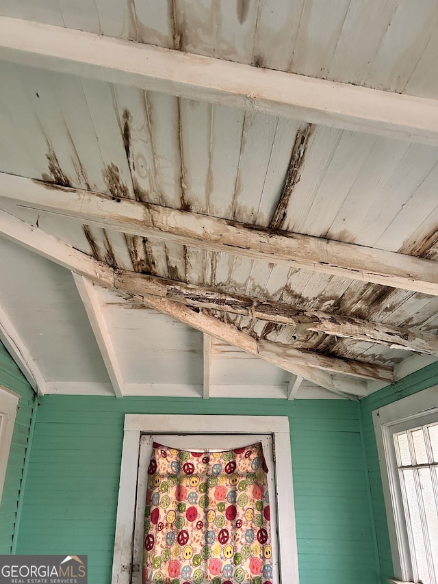 room details featuring wood ceiling and beam ceiling