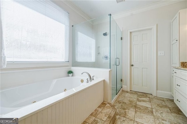 full bath featuring vanity, baseboards, ornamental molding, a shower stall, and a tub with jets