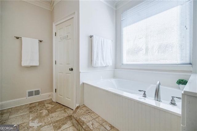 full bathroom with visible vents, crown molding, baseboards, and a bath