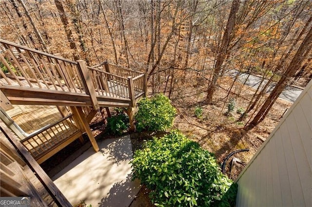 exterior space featuring a deck and a patio