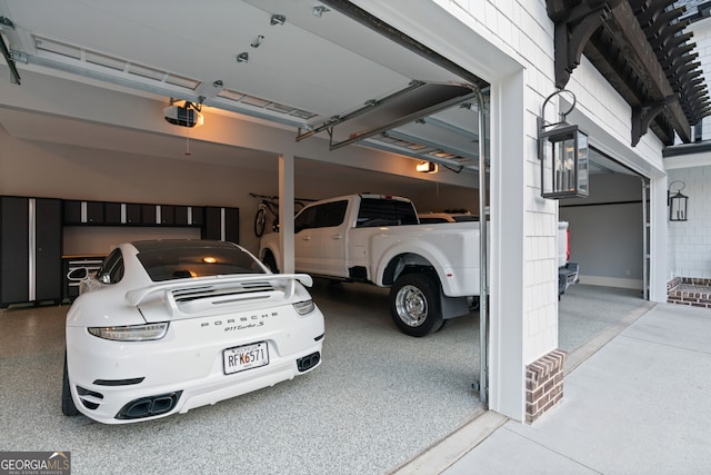 garage featuring a garage door opener