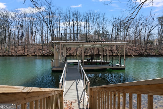 view of dock with a water view and boat lift