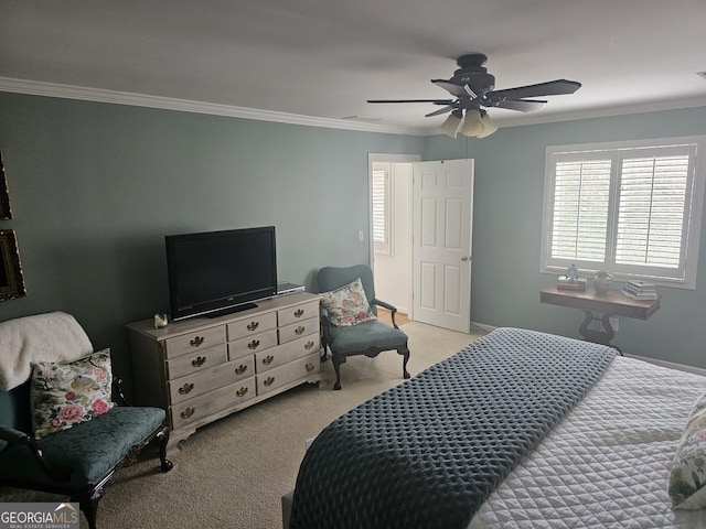 bedroom featuring light carpet, ornamental molding, a ceiling fan, and baseboards