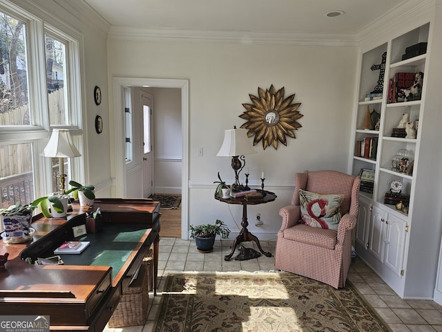 interior space with light tile patterned floors, built in shelves, and crown molding