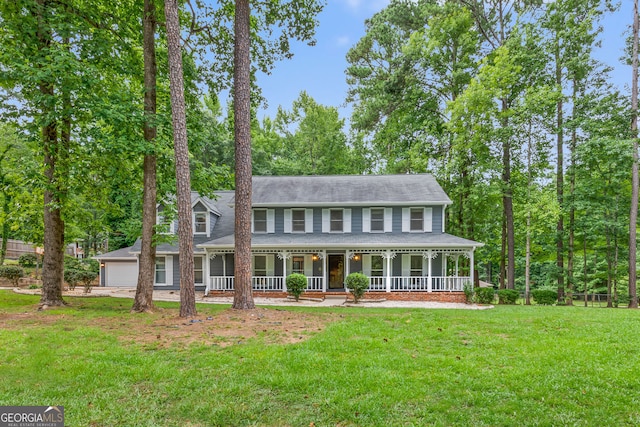 view of front of house featuring a porch and a front yard