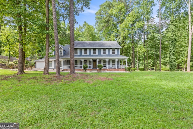 view of front of home with a porch and a front lawn