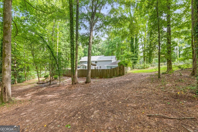 view of yard featuring fence