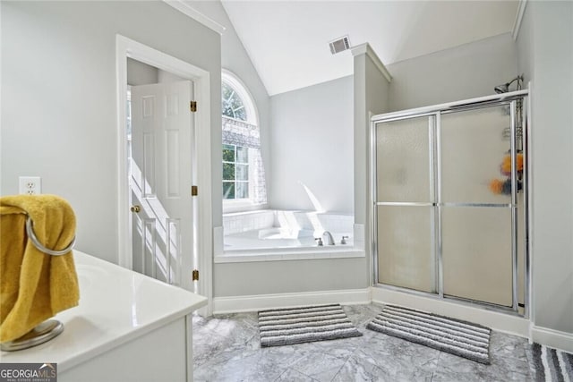 bathroom with a shower stall, visible vents, vaulted ceiling, and a bath