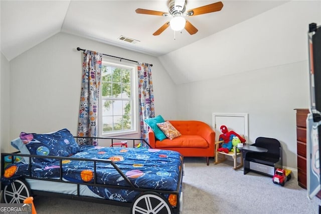 bedroom with carpet floors, lofted ceiling, visible vents, and a ceiling fan