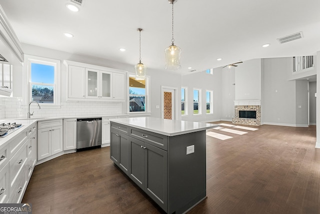 1295 Stonewood Field Rd, Watkinsville, GA 30677 - kitchen with appliances with stainless steel finishes, gray cabinets, tasteful backsplash, white cabinetry, and recessed lighting