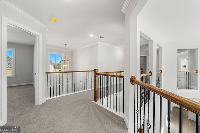 1295 Stonewood Field Rd, Watkinsville, GA 30677 - corridor featuring a chandelier, carpet floors, crown molding, and an upstairs landing