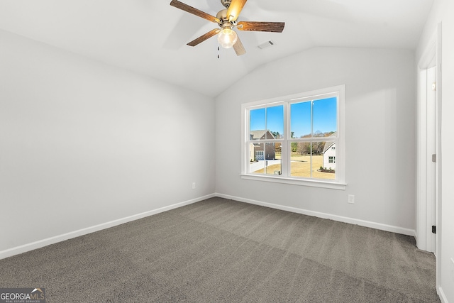1295 Stonewood Field Rd, Watkinsville, GA 30677 - empty room featuring vaulted ceiling, ceiling fan, and dark colored carpet