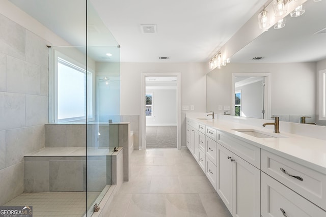 1295 Stonewood Field Rd, Watkinsville, GA 30677 - bathroom with double vanity, tiled shower, tile patterned floors, and a bath
