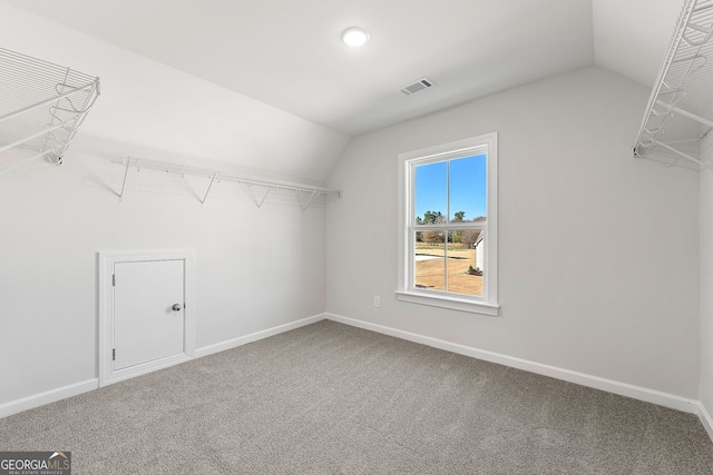 1295 Stonewood Field Rd, Watkinsville, GA 30677 - spacious closet with lofted ceiling and carpet