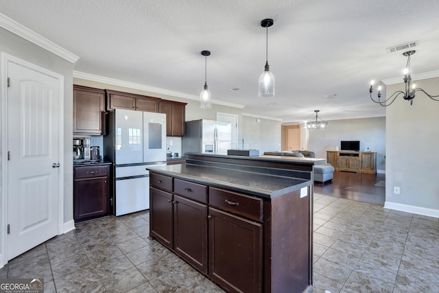 kitchen featuring dark countertops, smart refrigerator, a kitchen island, and stainless steel fridge with ice dispenser