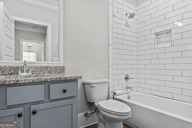 bathroom with  shower combination, crown molding, vanity, and toilet