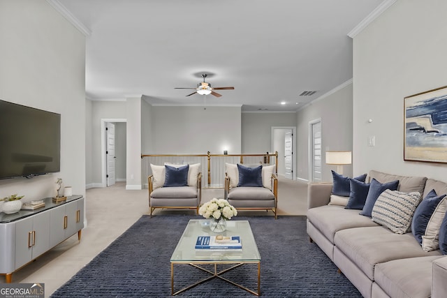 living room featuring light carpet, a ceiling fan, baseboards, visible vents, and crown molding