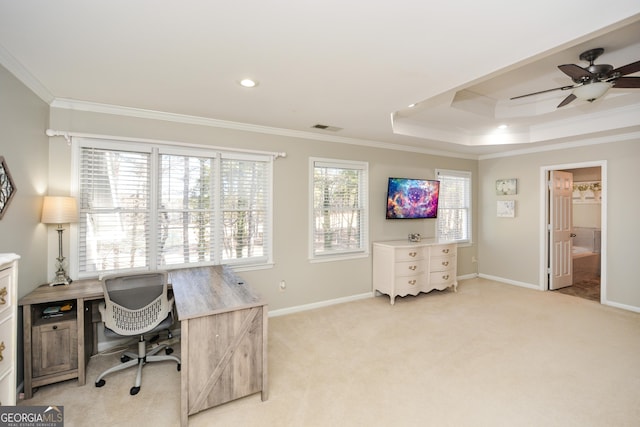 office with visible vents, crown molding, light carpet, and baseboards