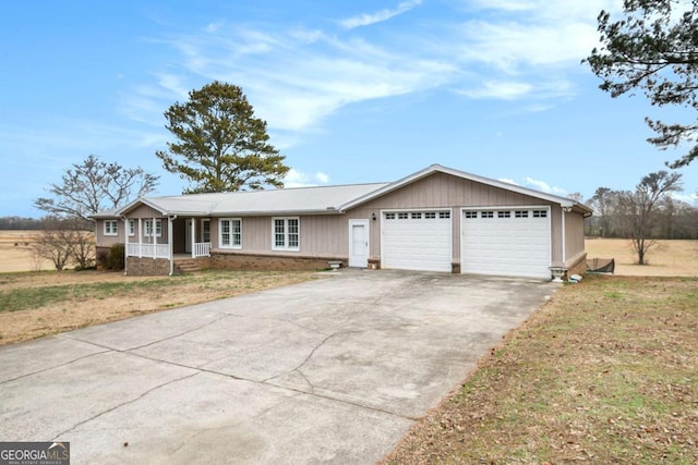 single story home with covered porch and a front lawn