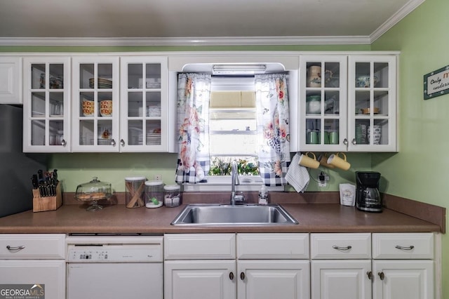 kitchen featuring a sink, dark countertops, glass insert cabinets, and dishwasher