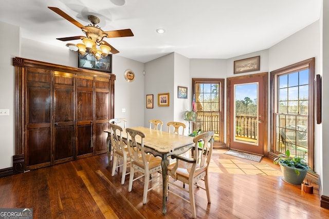 dining room featuring ceiling fan and wood finished floors