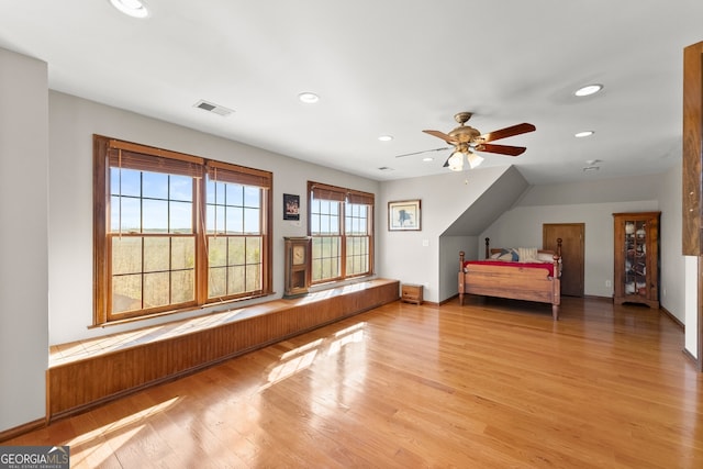 unfurnished bedroom with light wood finished floors, recessed lighting, visible vents, a ceiling fan, and baseboards