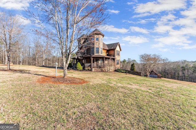 view of yard with a porch