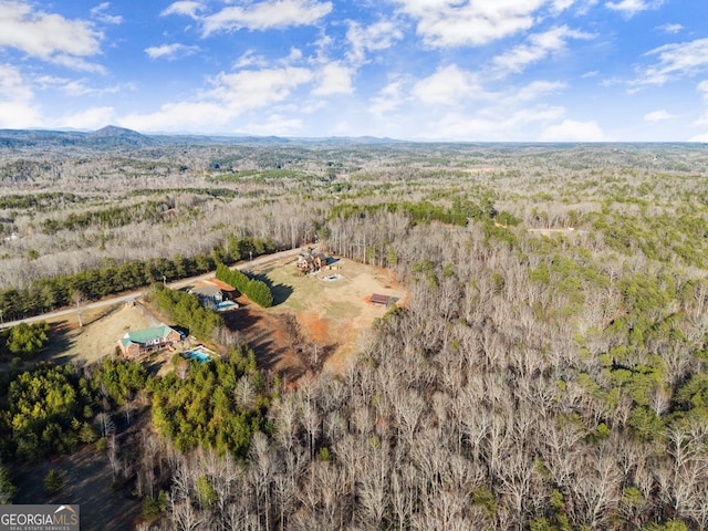 aerial view featuring a forest view