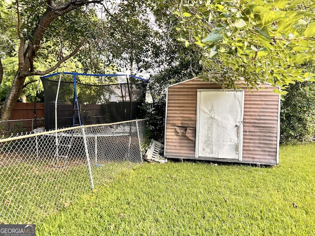 view of shed with fence