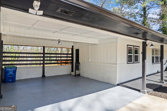 exterior space with a carport