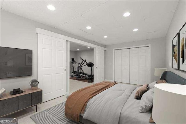 bedroom with a closet and recessed lighting