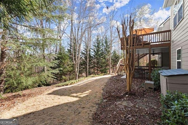 view of yard featuring stairway