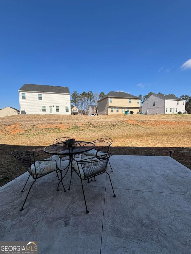 view of patio / terrace featuring a residential view