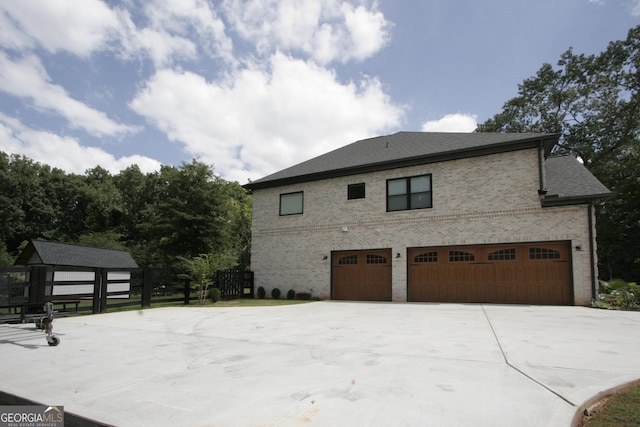 view of property exterior featuring brick siding