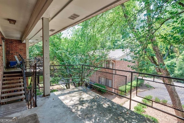 view of patio / terrace featuring visible vents and a balcony