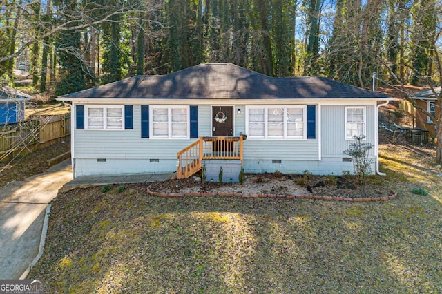 ranch-style house with crawl space and fence