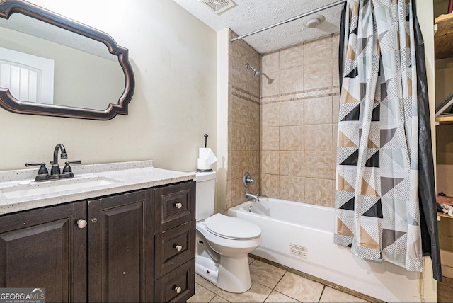 bathroom featuring shower / tub combo, visible vents, toilet, tile patterned flooring, and vanity