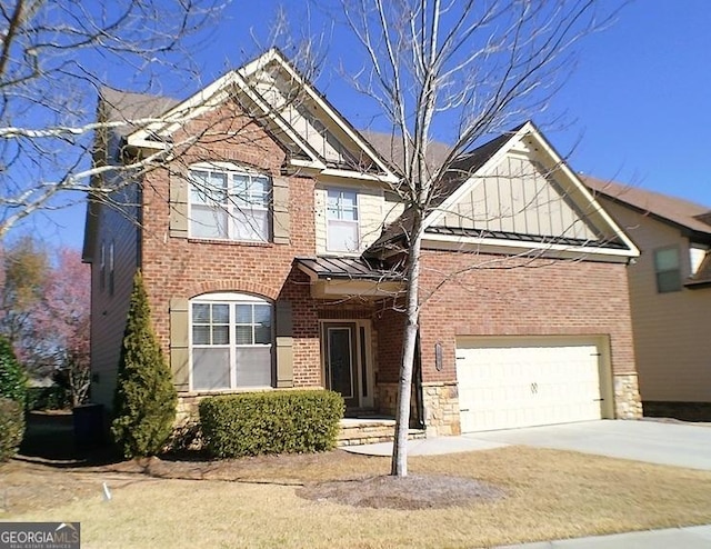 view of front of house featuring metal roof, a garage, brick siding, driveway, and a standing seam roof