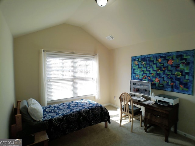 carpeted bedroom with visible vents, vaulted ceiling, and baseboards